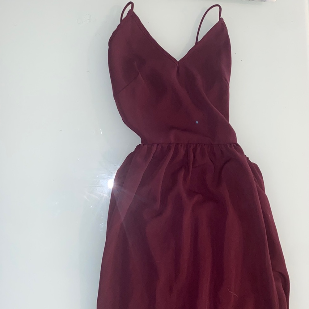 Maxi Dress with side slits and ties in back.